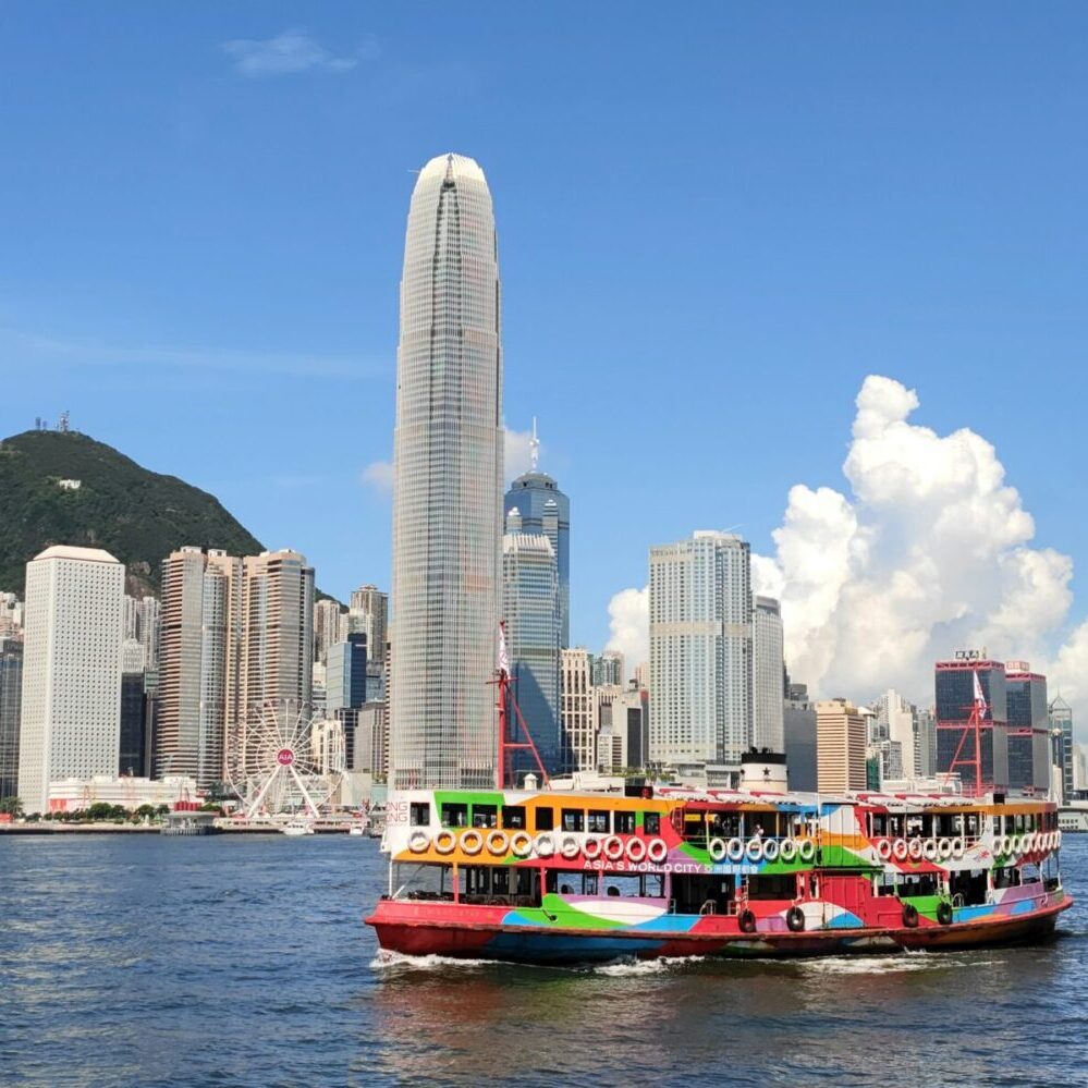 A Star Ferry crossing Victoria Harbour with Tower 2 in the background. Photo by Cheung Yin