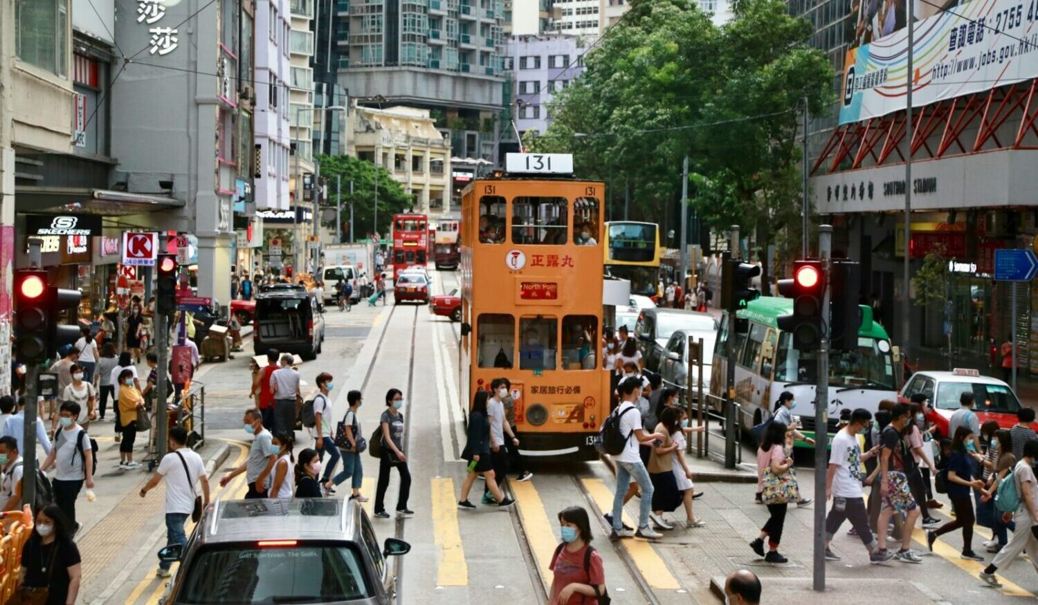 Orange double decker tram in Wan Chai. Photo by Alison Pang