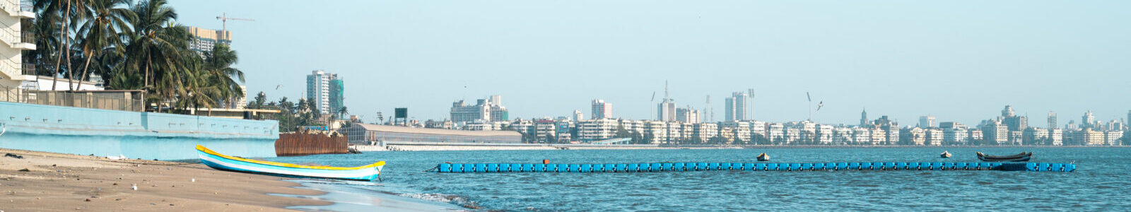 Juhu beach and skyline of Mumbai, India by Berit K.