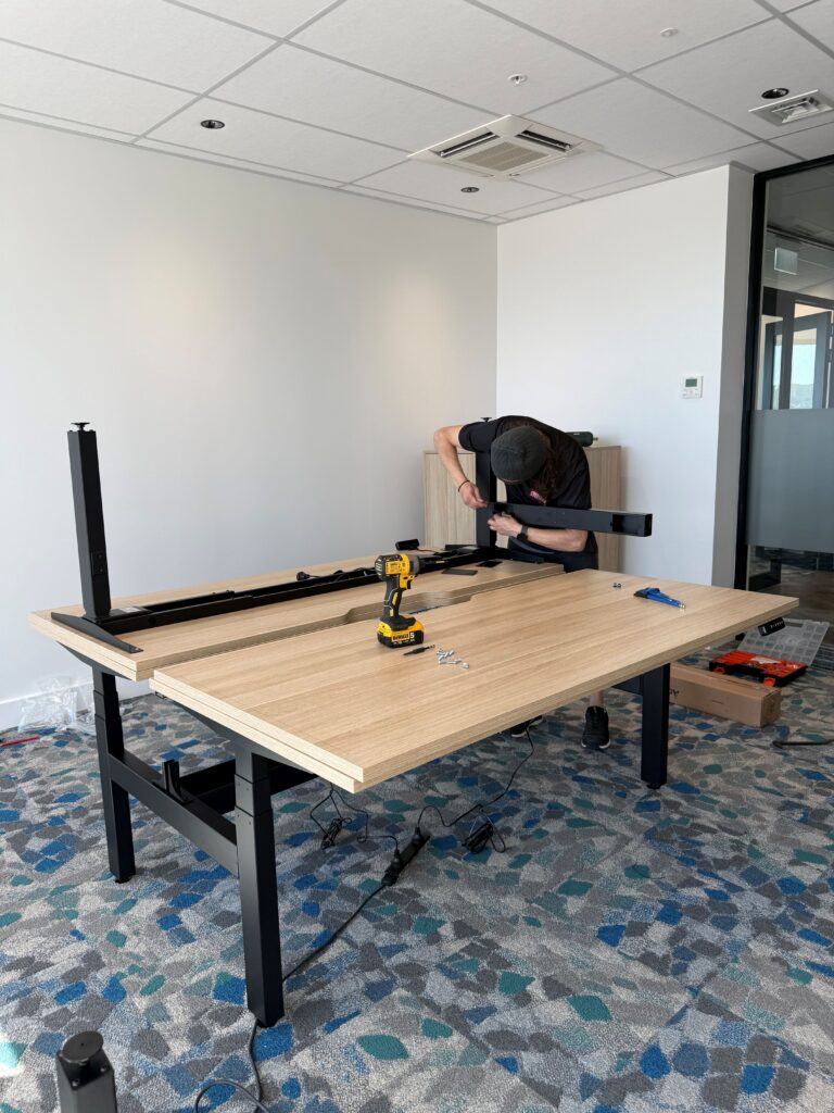 Setting up the desks in Crown's new offices Porirua, Wellington Sept 2026