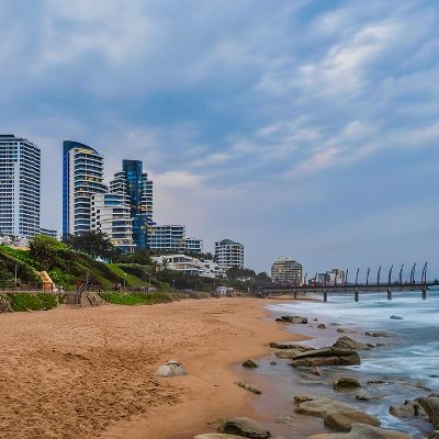 Umhlanga beach and seaside buildings during sunset. Photo by Arnold Petersen