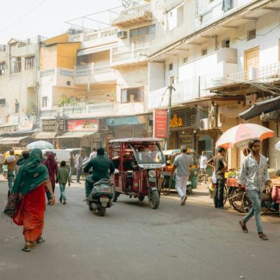 New Delhi Bustling Main Bazar Road, New Delhi, India by Aliaksei Antropau